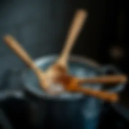 Boiling wooden spoons in a pot