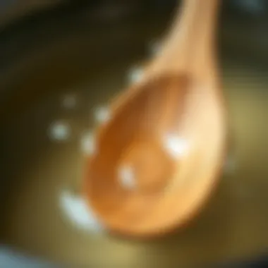 Close-up of a wooden spoon submerged in water