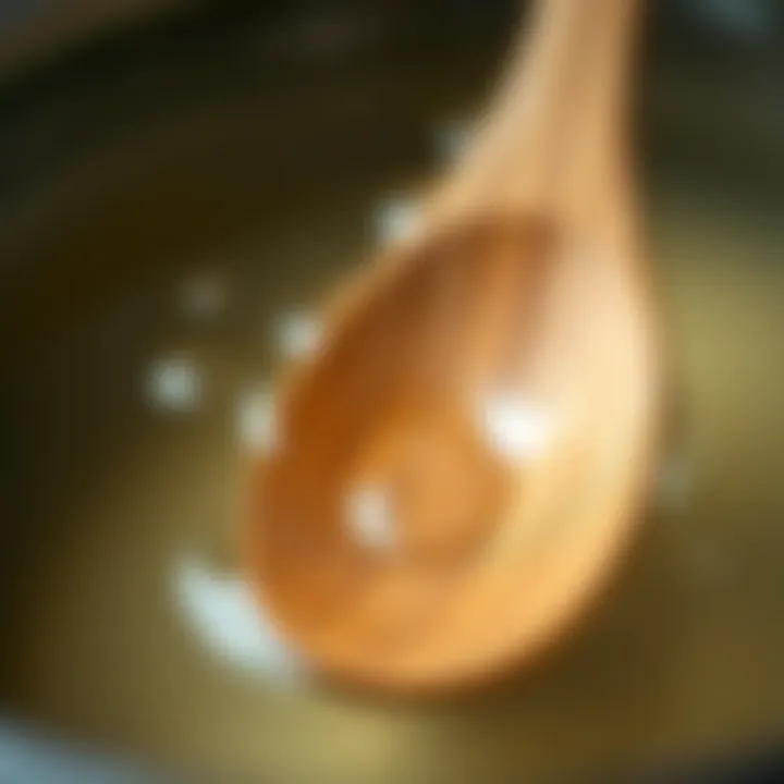 Close-up of a wooden spoon submerged in water